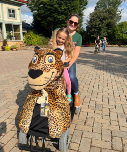 mom and daughter riding scooterpal, scooter with animal covering