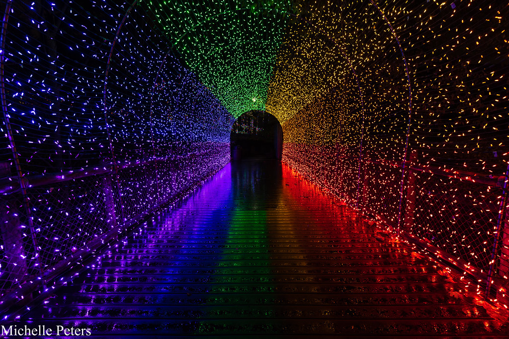 rainbow colored lights in a tunnel