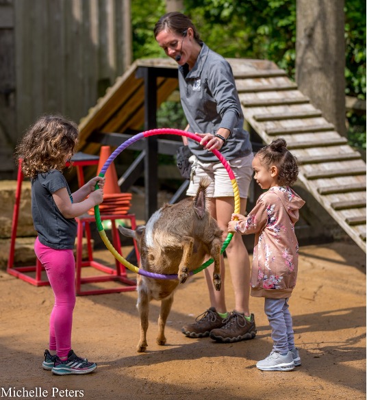 kids helping keeper during barnyard bonanza