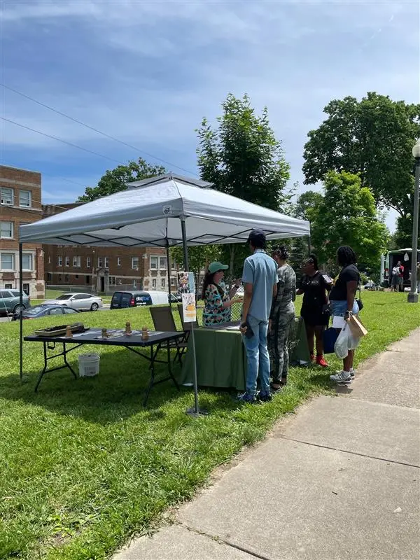 americorps volunteers promoting food security at avondale family fun day