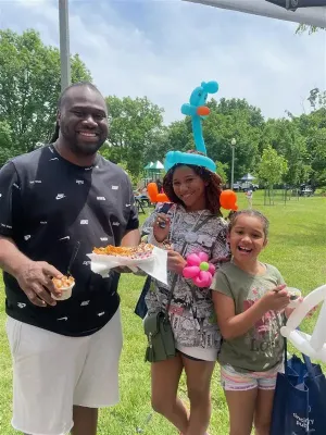 americorps volunteers promoting food security at avondale family fun day