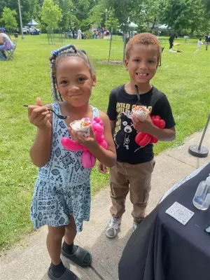 americorps volunteers promoting food security at avondale family fun day