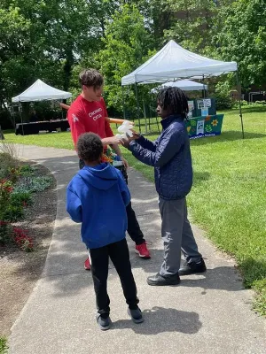 americorps volunteers promoting food security at avondale family fun day