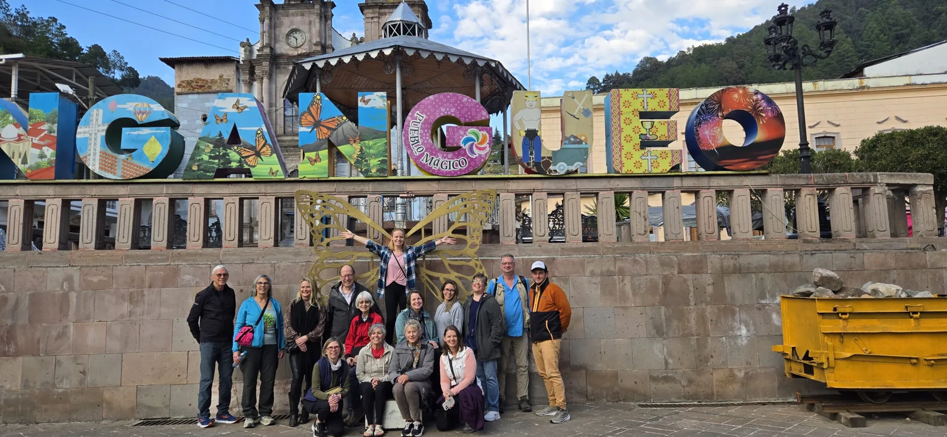 travel with the zoo trip group posing for group photo