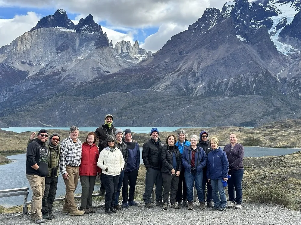 Zoo trip group photo in Patagonia in front of mountains