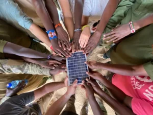 hands on a solar panel